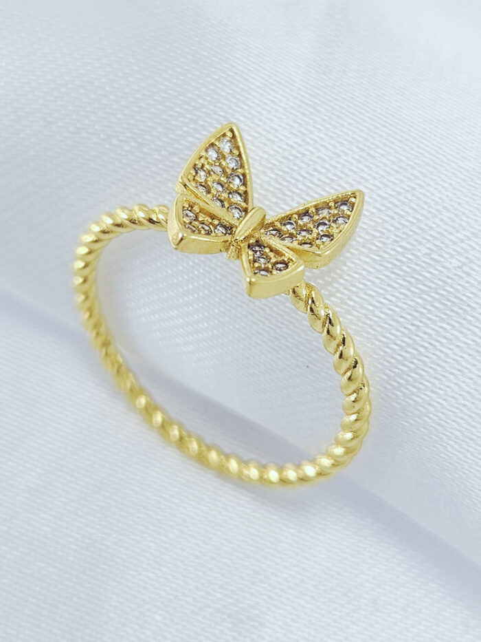 Anel borboleta cravejada base trançada