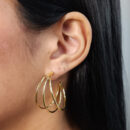 Brinco fio liso triplo