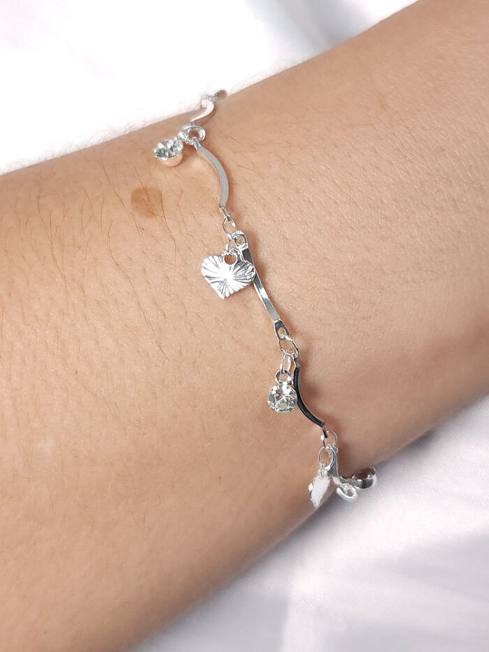 Pulseirs pêndulos corações martelados e pontos de luz