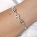 Pulseira correntes duplas com trevo detalhado