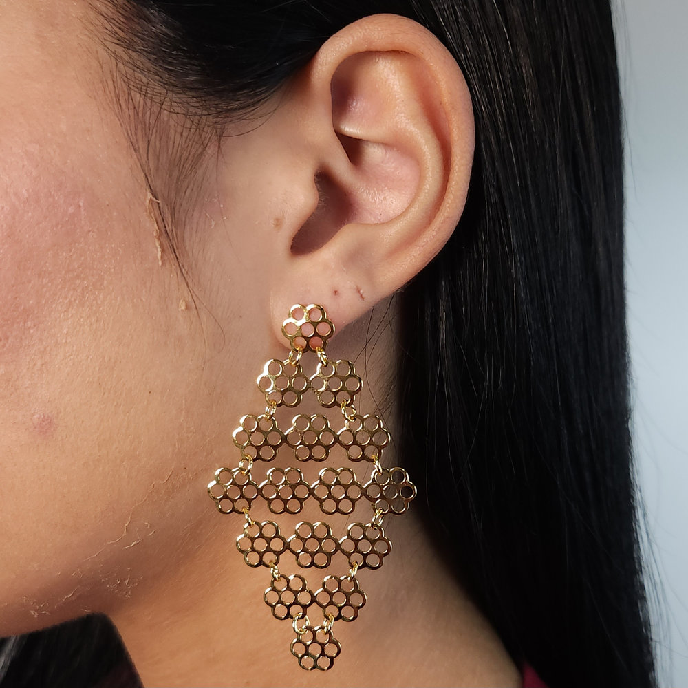 Brinco colmeia pêndulo