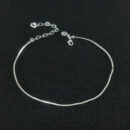 Tornozeleira minimalista com coração cristal