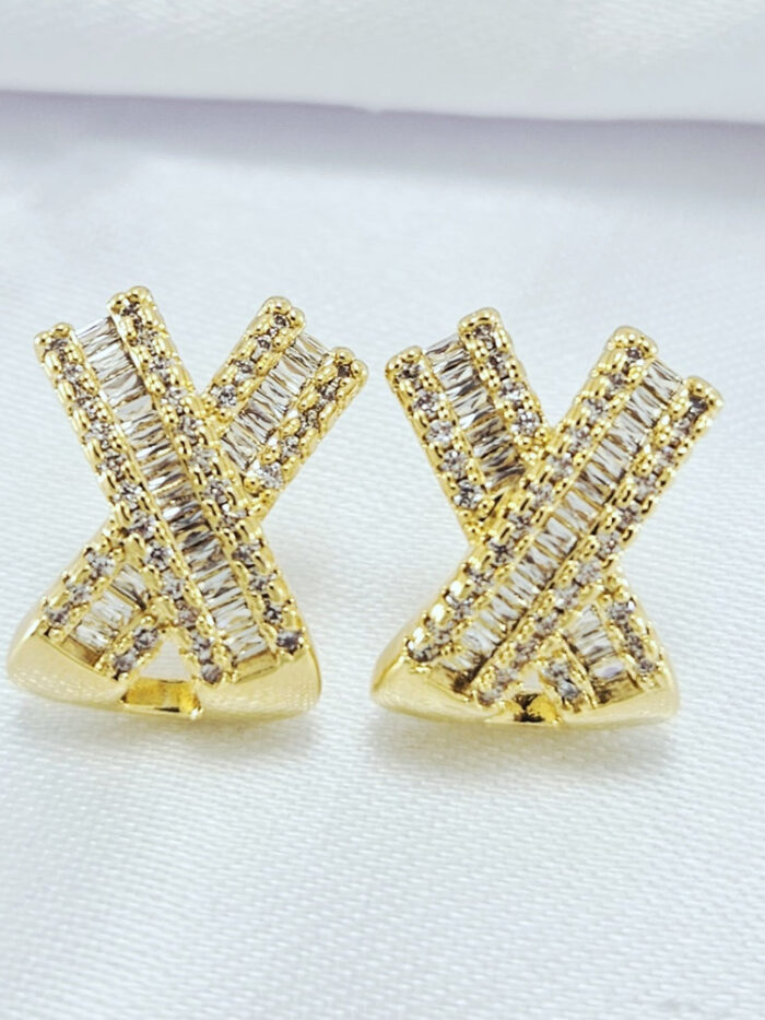 Brinco  formato `X` com base baguete