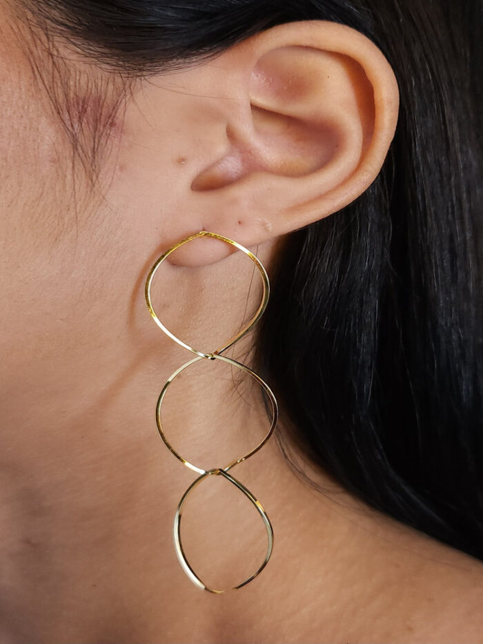 Brinco oval triplo vazados