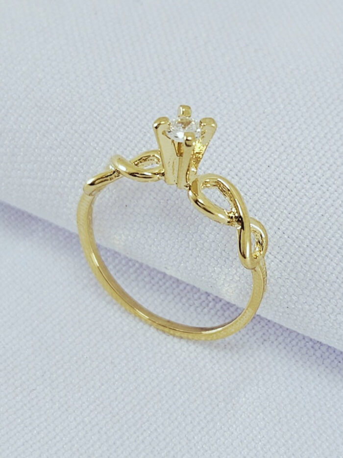 Anel simbolo do infinito e pedra cristal