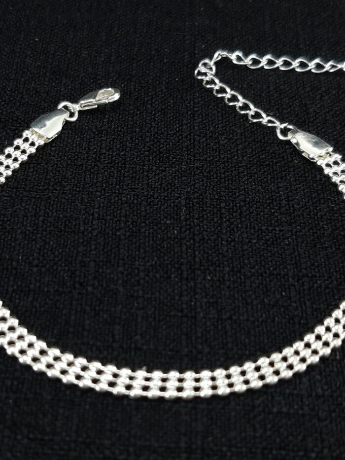 Pulseira modela malha em bolinhas tripla