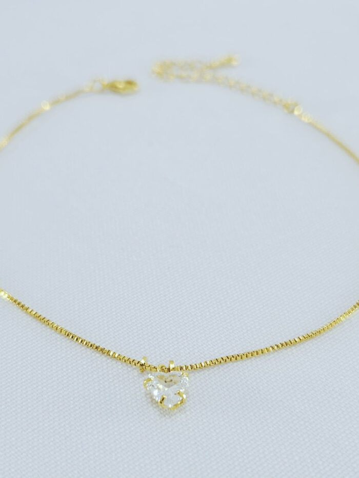 Tornozeleira com coração de cristal