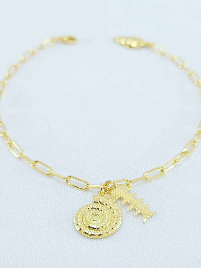 Pulseira cartiê com pêndulos peixe e couchas