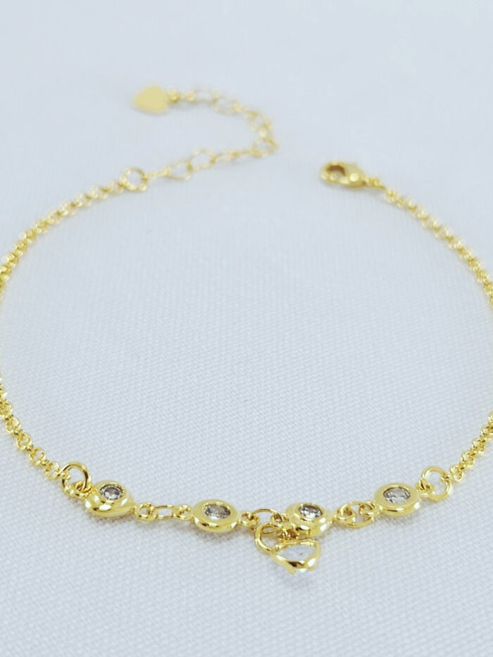 Pulseira com detalhe ponto de luz e coração