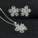 Conjunto flor pedras cristais