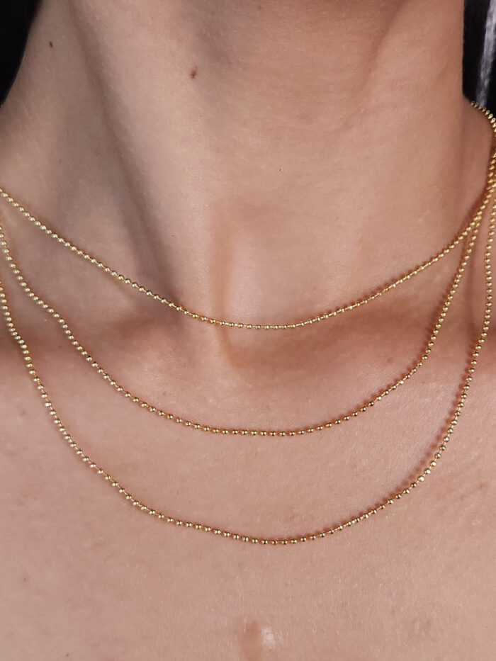 Gargantilha tripla bolinhas dourada