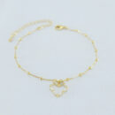 Pulseira detalhe bolinhas e coração pêndulo