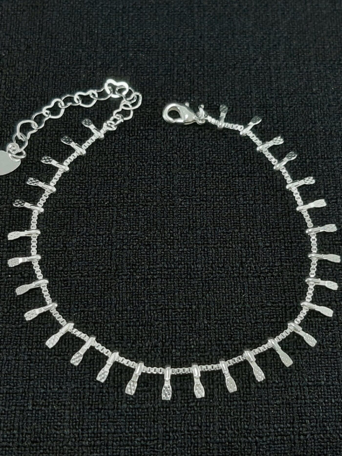 Pulseira detalhe caninho ponta chapeada