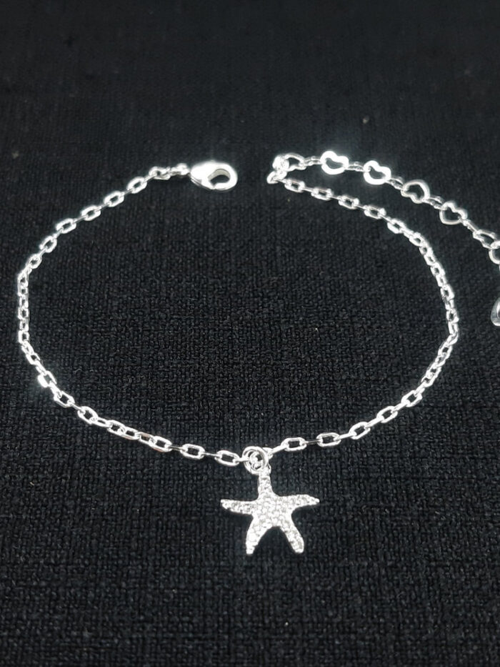 Pulseira elos círculo vazado com estrela do mar cravejada