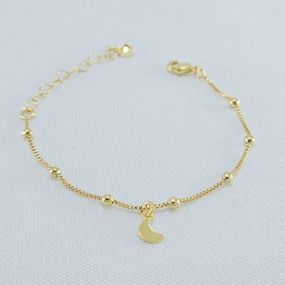 Pulseira infantil detalhe bolinhas e lua pêndulo