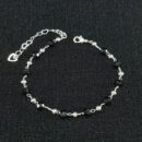 Pulseira com bolas preta e prateada