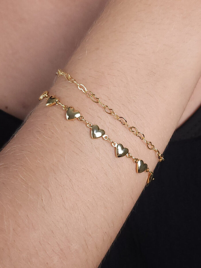 Pulseira dupla corações vazados e boleados lisos