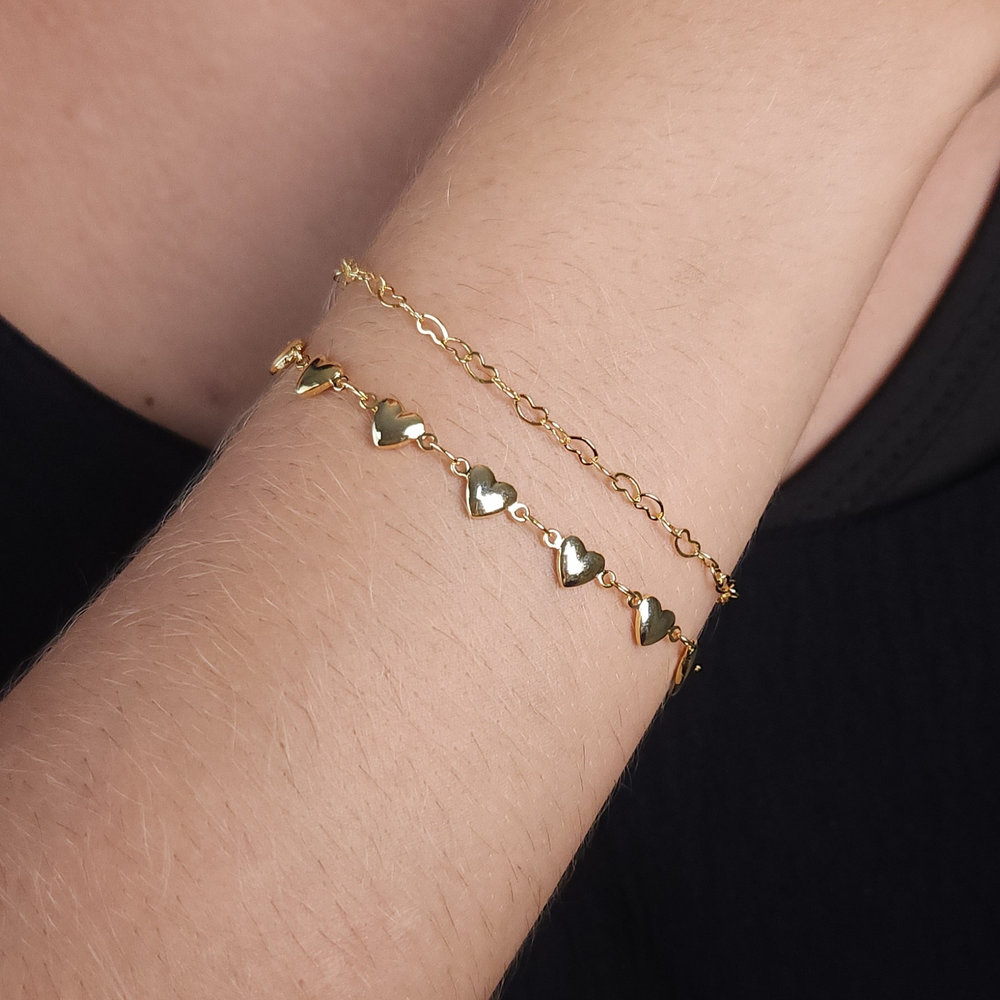 Pulseira dupla corações vazados e boleados lisos