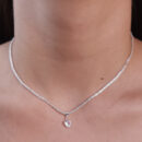 Gargantilha malha vazada com pingente coração cristal