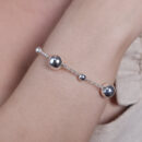 Pulseira com bolas prateada