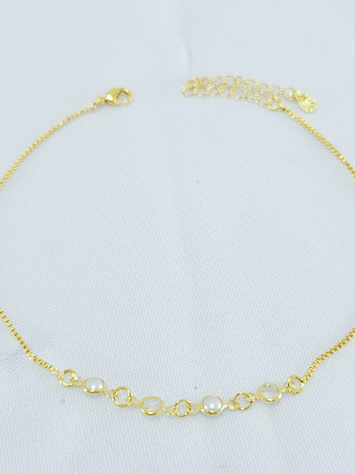 Tornozeleira pérolas com ponto de luz