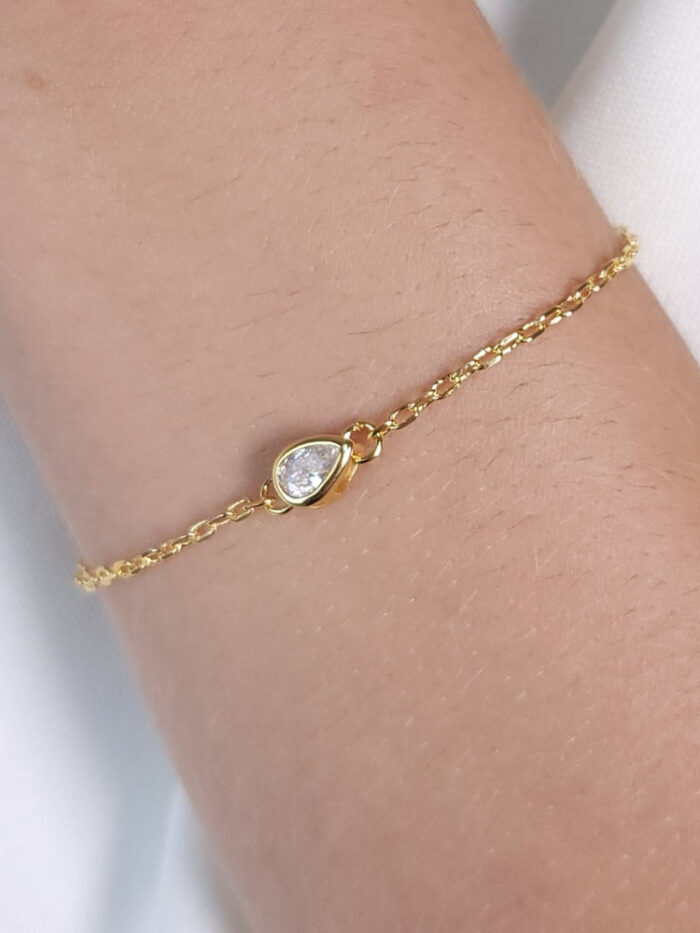 Pulseira gota cristal borda dourada