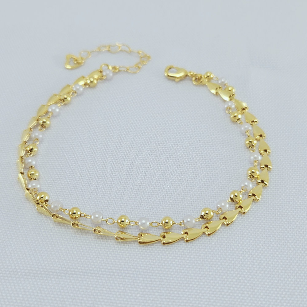 Pulseira dupla detalhe pérolas