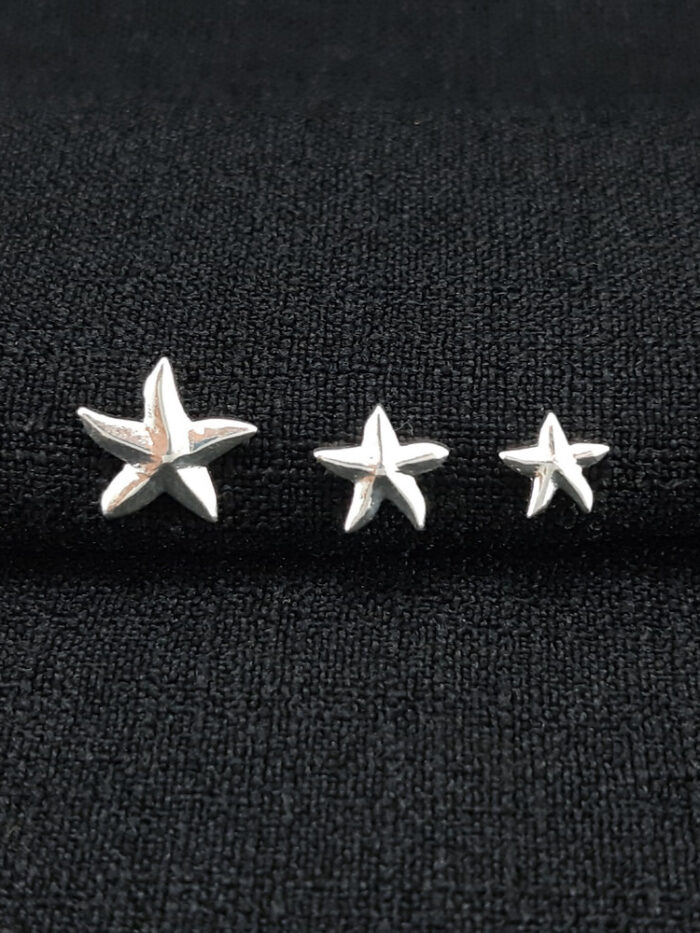 Brinco trio de estrelas lisas