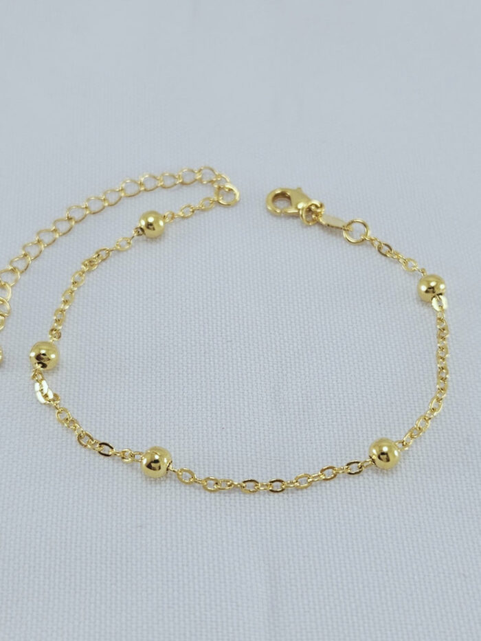 Pulseira detalhe bolinhas