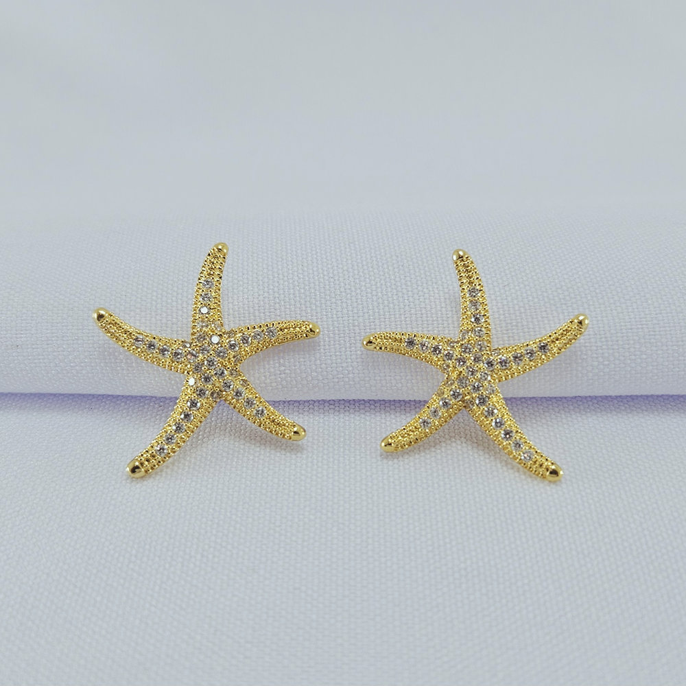 Brinco estrela do mar detalhe cravejado