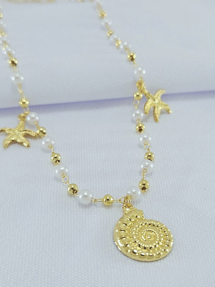 Gargantilha pérola detalhe concha e estrelas