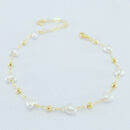 Pulseira detalhe coração com bolinhas douradas