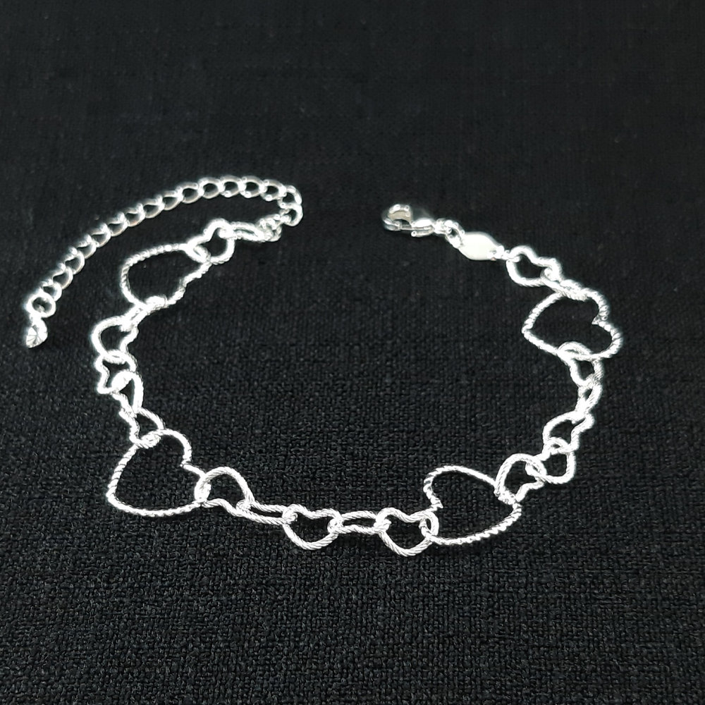 Pulseira elos corações vazados detalhados