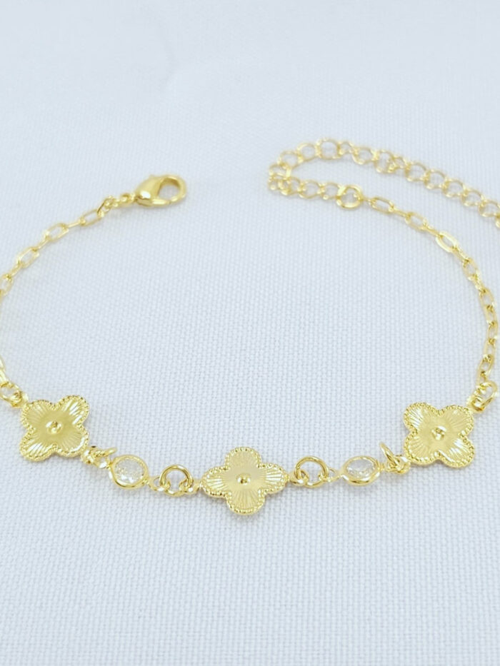 Pulseira detalhe trevo chapeado com ponto de luz