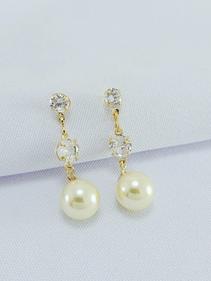 Brinco dois pontos de luz com pérola pêndulo