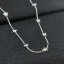 Gargantilha longuinho com estrelas