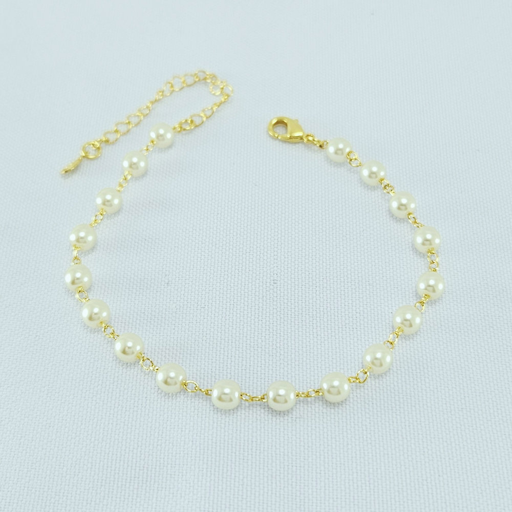 Pulseira detalhe pérolas