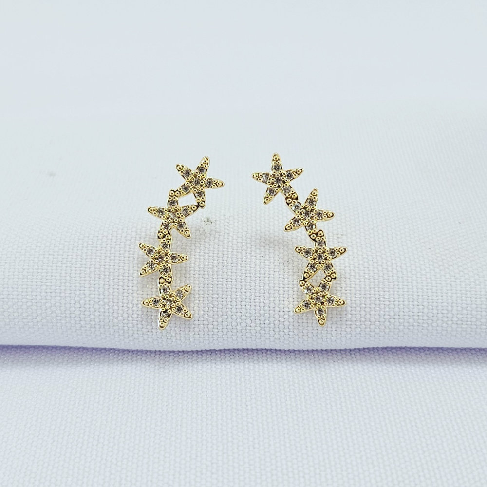 Brinco estrelas cravejadas